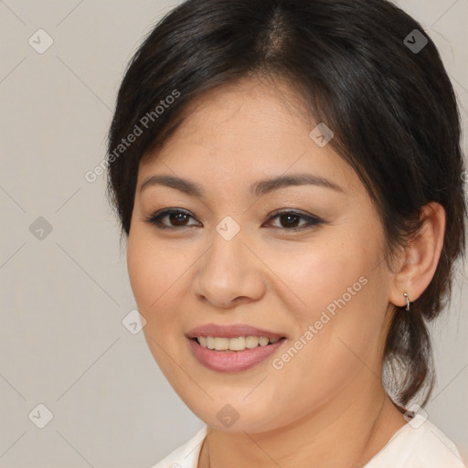 Joyful asian young-adult female with medium  brown hair and brown eyes