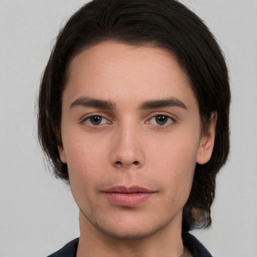 Neutral white young-adult male with medium  brown hair and brown eyes