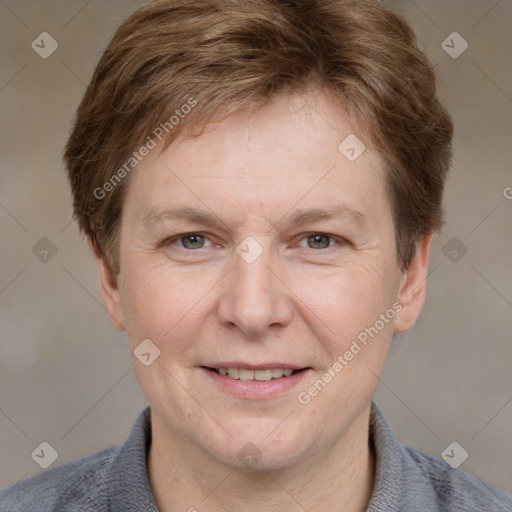 Joyful white adult male with short  brown hair and grey eyes