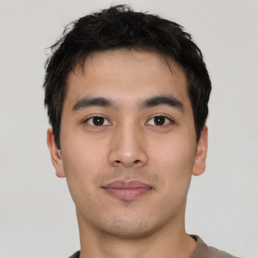 Neutral white young-adult male with short  black hair and brown eyes