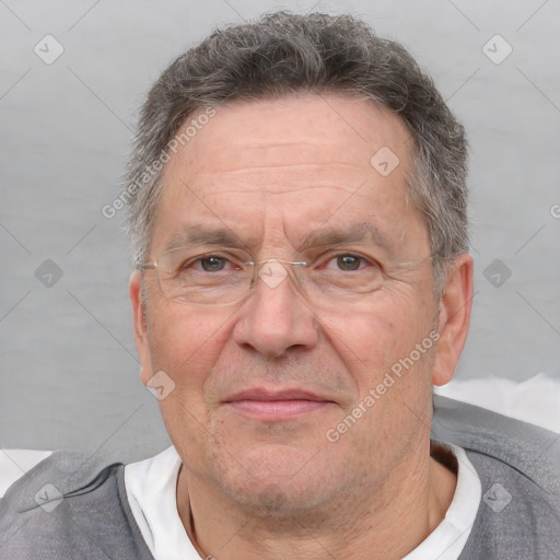 Joyful white middle-aged male with short  brown hair and brown eyes