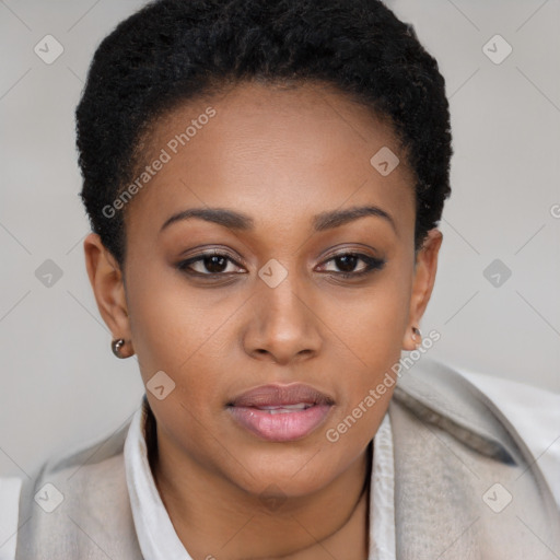 Joyful black young-adult female with short  brown hair and brown eyes