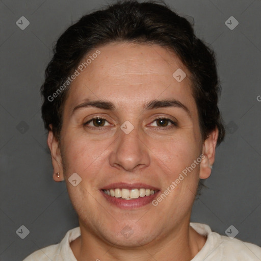 Joyful white adult female with short  brown hair and brown eyes