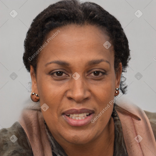 Joyful black adult female with short  brown hair and brown eyes