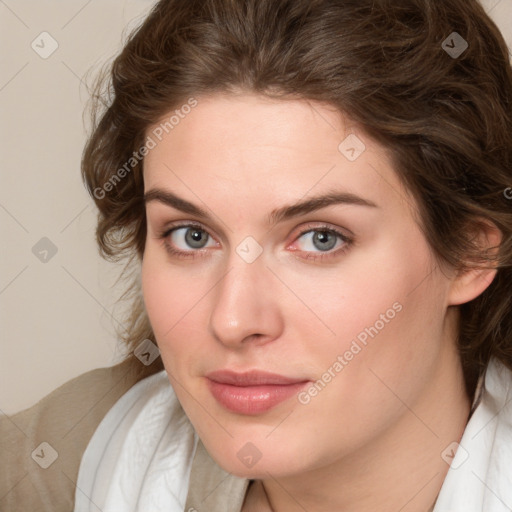 Joyful white young-adult female with medium  brown hair and green eyes