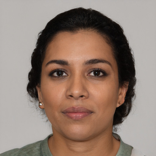 Neutral latino young-adult female with medium  black hair and brown eyes