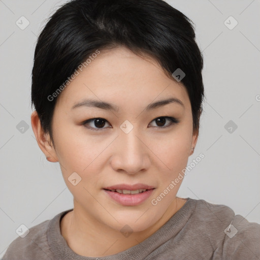 Joyful asian young-adult female with short  brown hair and brown eyes