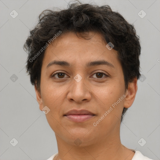 Joyful latino young-adult female with short  brown hair and brown eyes