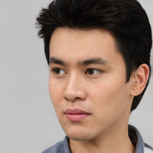 Neutral white young-adult male with short  black hair and brown eyes