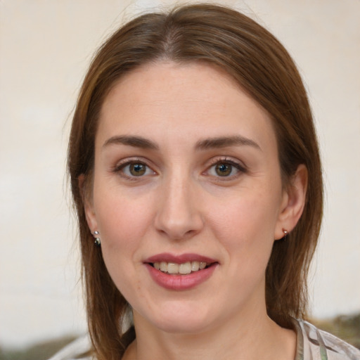 Joyful white young-adult female with medium  brown hair and grey eyes