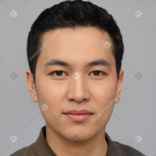 Joyful white young-adult male with short  black hair and brown eyes