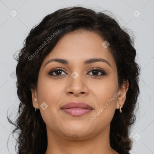 Joyful latino young-adult female with long  brown hair and brown eyes