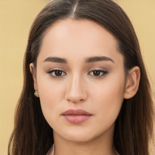 Neutral white young-adult female with long  brown hair and brown eyes