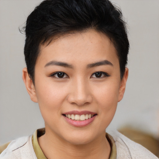 Joyful latino young-adult female with short  brown hair and brown eyes