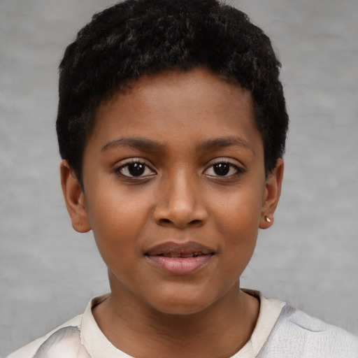 Joyful black child female with short  black hair and brown eyes