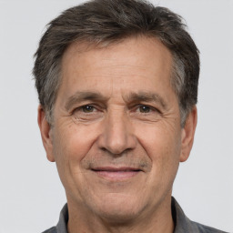 Joyful white middle-aged male with short  brown hair and brown eyes