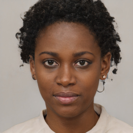 Neutral black young-adult female with short  brown hair and brown eyes