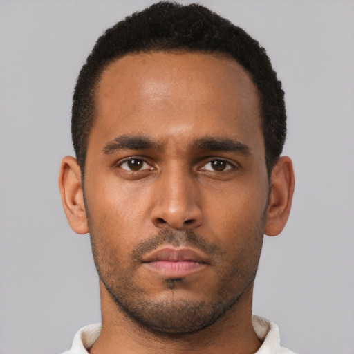 Neutral black young-adult male with short  black hair and brown eyes