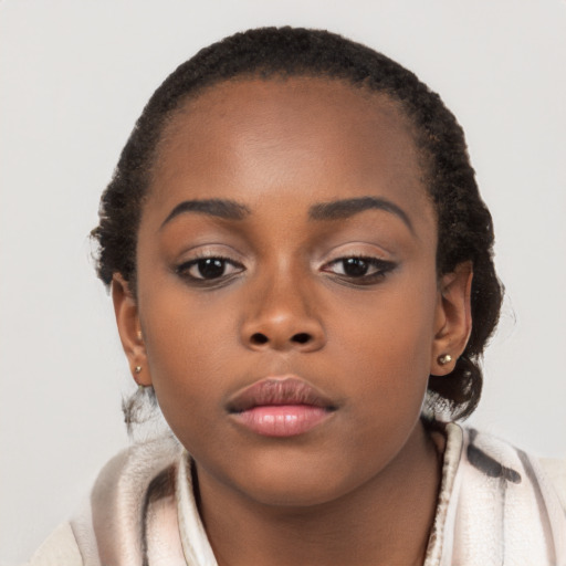 Neutral black young-adult female with short  brown hair and brown eyes