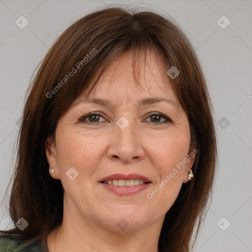 Joyful white adult female with medium  brown hair and brown eyes