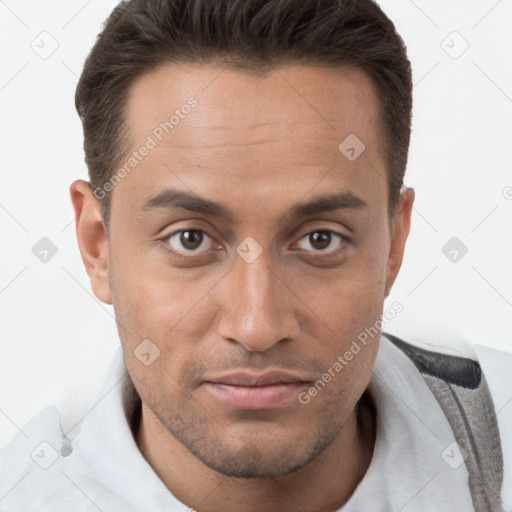 Joyful white young-adult male with short  brown hair and brown eyes