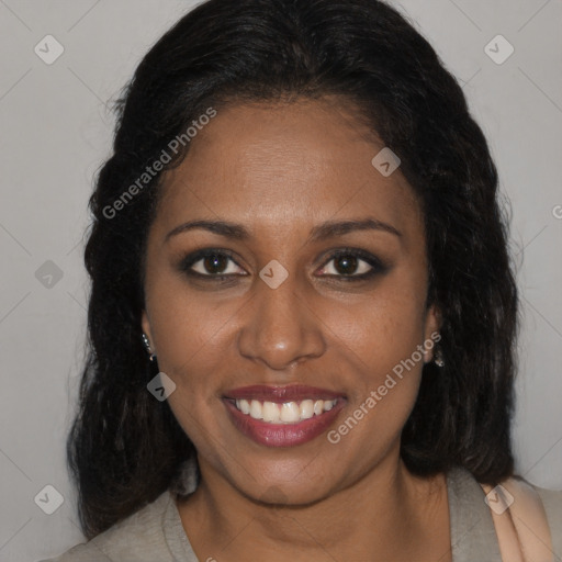 Joyful black young-adult female with medium  brown hair and brown eyes