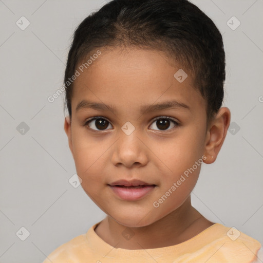 Joyful white child female with short  brown hair and brown eyes