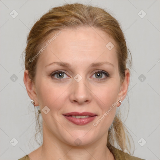 Joyful white young-adult female with medium  brown hair and blue eyes