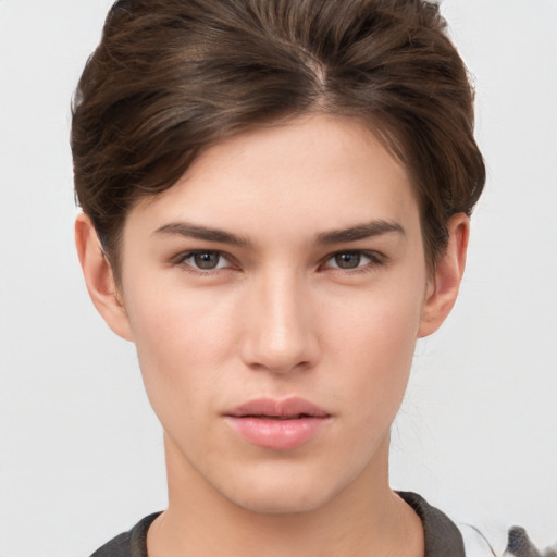 Neutral white young-adult female with short  brown hair and brown eyes