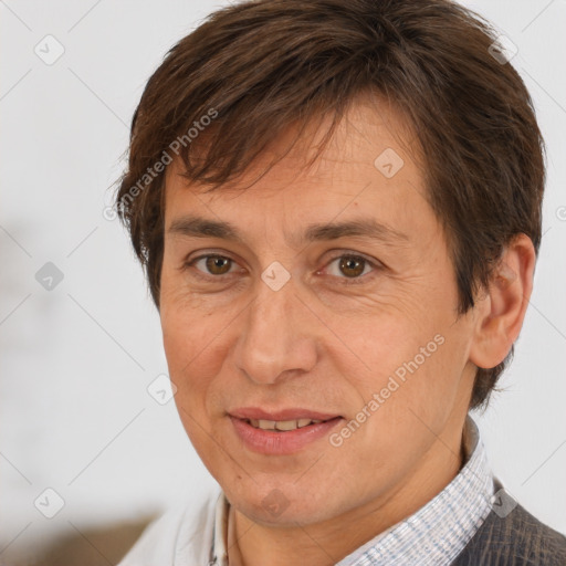 Joyful white adult male with short  brown hair and brown eyes