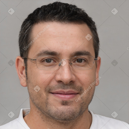 Joyful white adult male with short  brown hair and brown eyes