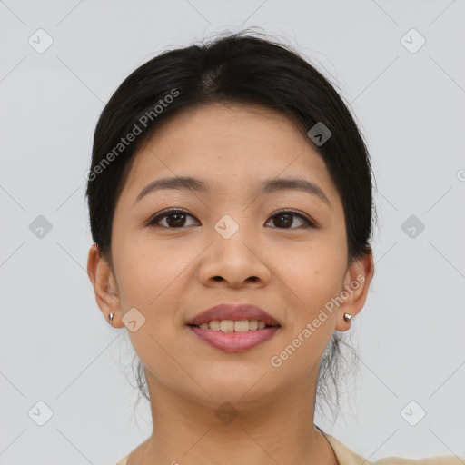 Joyful asian young-adult female with short  brown hair and brown eyes