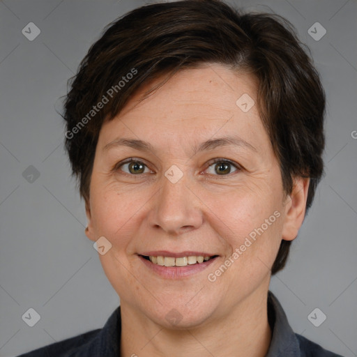 Joyful white adult female with short  brown hair and brown eyes