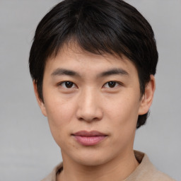 Neutral asian young-adult male with short  brown hair and brown eyes