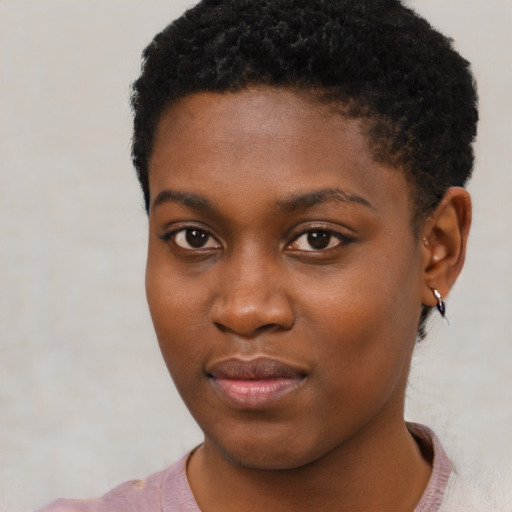 Neutral black young-adult female with short  brown hair and brown eyes