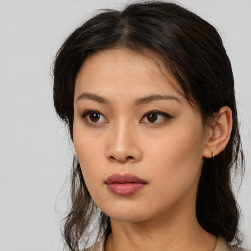 Neutral asian young-adult female with long  brown hair and brown eyes