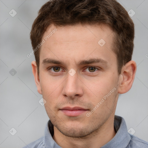 Neutral white young-adult male with short  brown hair and grey eyes