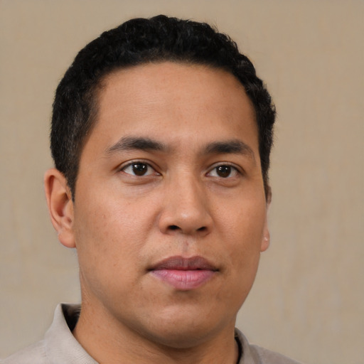 Neutral latino young-adult male with short  brown hair and brown eyes