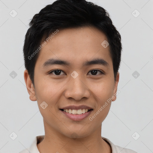 Joyful asian young-adult male with short  black hair and brown eyes