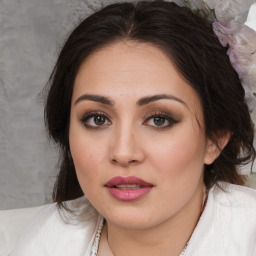 Joyful white young-adult female with medium  brown hair and brown eyes