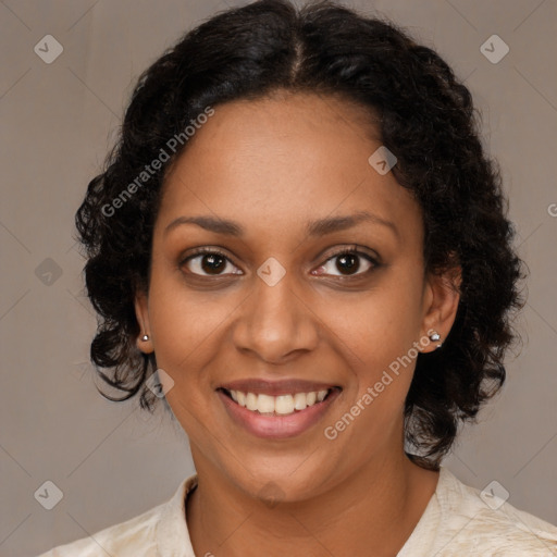 Joyful black young-adult female with medium  brown hair and brown eyes