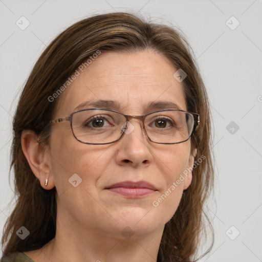 Joyful white adult female with medium  brown hair and grey eyes