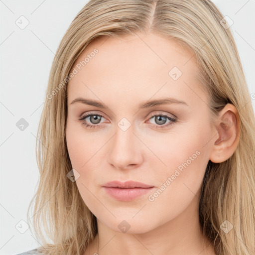 Neutral white young-adult female with long  brown hair and blue eyes