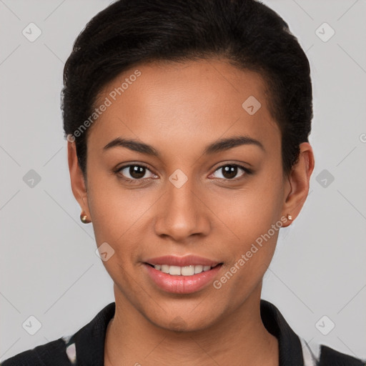 Joyful latino young-adult female with short  brown hair and brown eyes