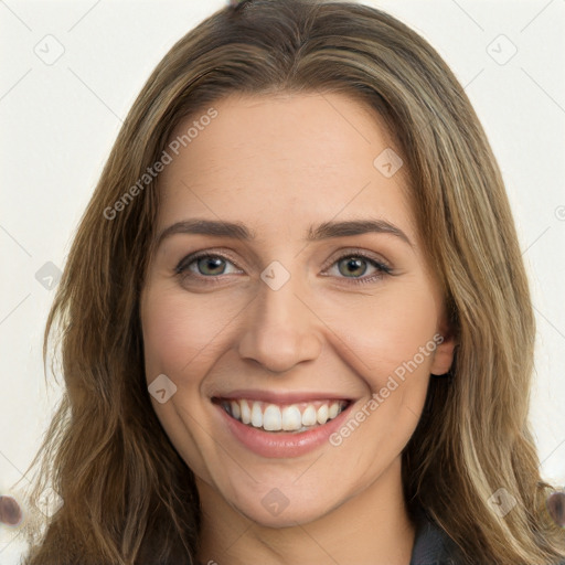 Joyful white young-adult female with long  brown hair and green eyes