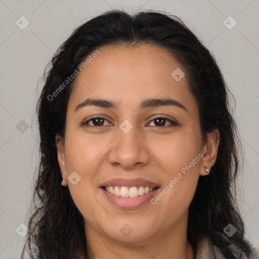 Joyful latino young-adult female with long  brown hair and brown eyes