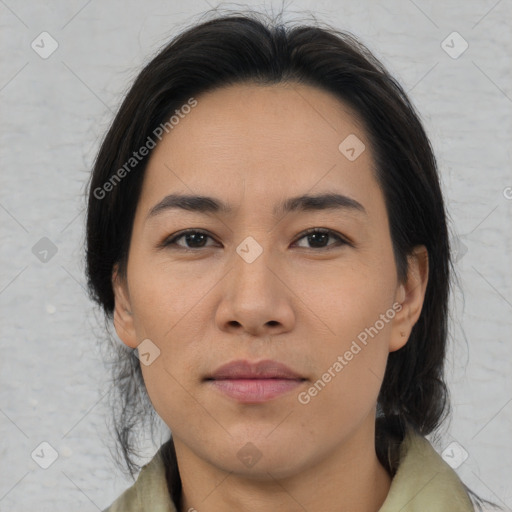 Joyful asian young-adult female with medium  brown hair and brown eyes