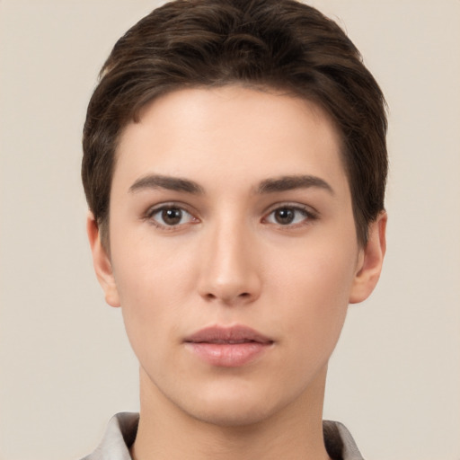 Neutral white young-adult female with short  brown hair and brown eyes