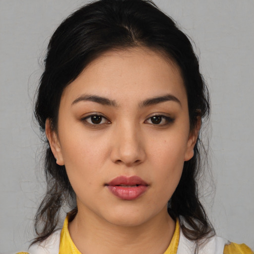 Neutral white young-adult female with medium  black hair and brown eyes