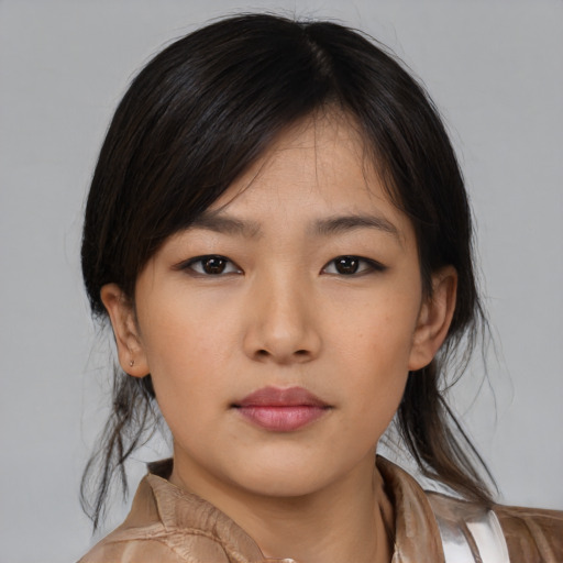 Neutral asian young-adult female with medium  brown hair and brown eyes
